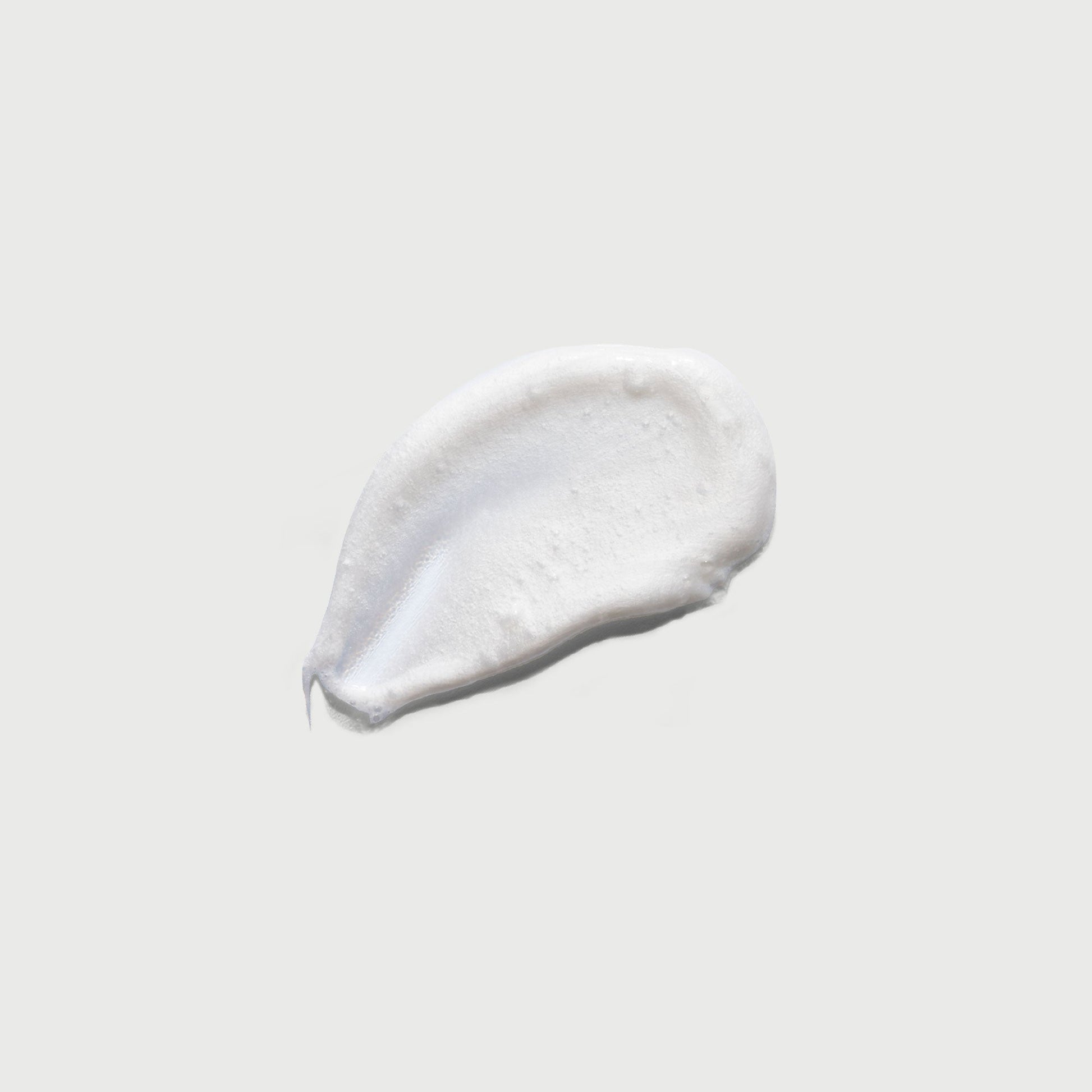 the-smoother-glycolic-acid-exfoliating-body-wash-j9 NATR-40002-Swatch-The-Smoother-Glycolic-Acid-Exfoliating-Body-Wash-bonebkgd.jpg