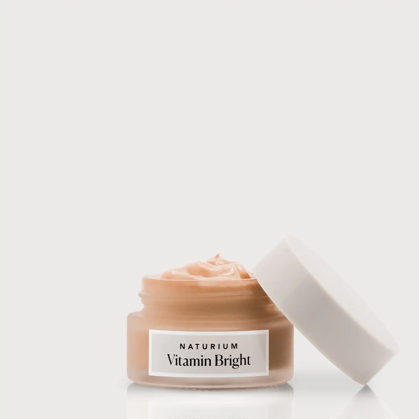 vitamin-bright-illuminating-eye-cream-f8 NATR-VitaminBright_DEEP_Primary_front_openjar_bone.webp